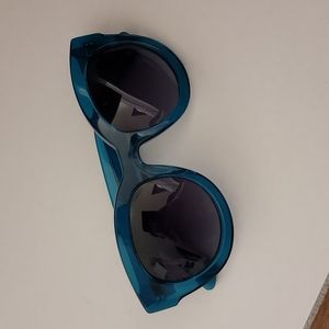Kipling Sunglasses. Clear Teal